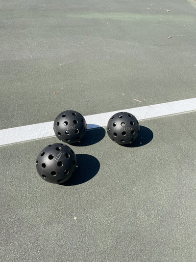 Black Pickleballs